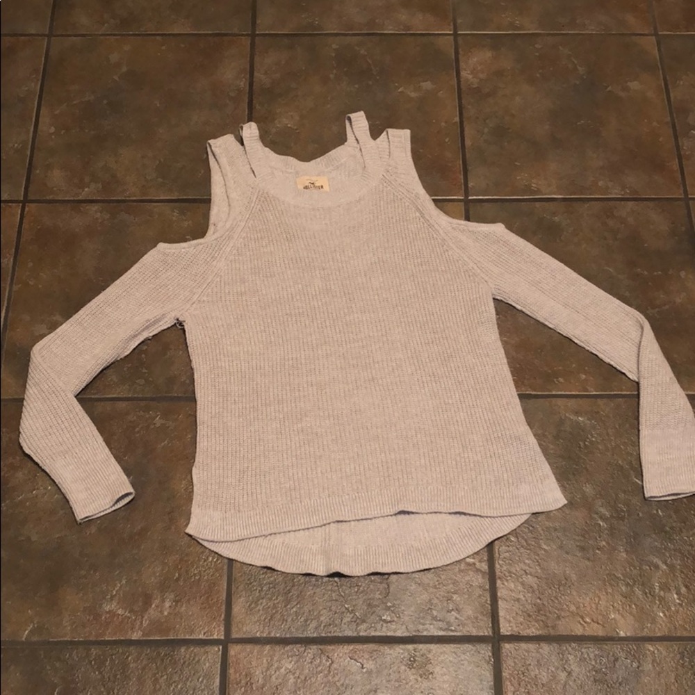Sweaters with uncovered shoulder